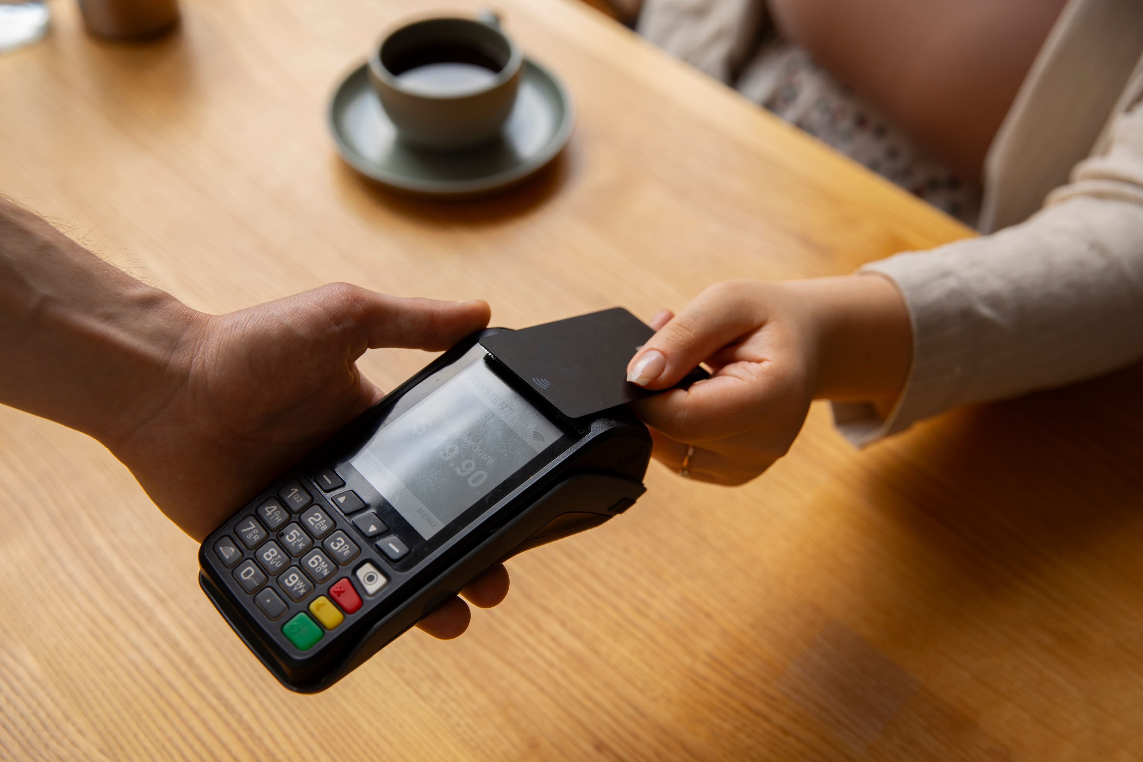 Customer making a contactless payment